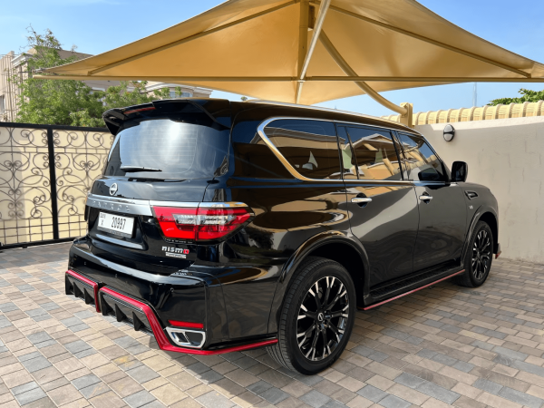 Rent Nissan Patrol (Black), 2023 in Dubai - Image 3