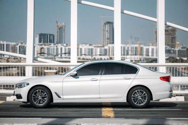Rent BMW 520i (White), 2020 in Dubai - Image 8